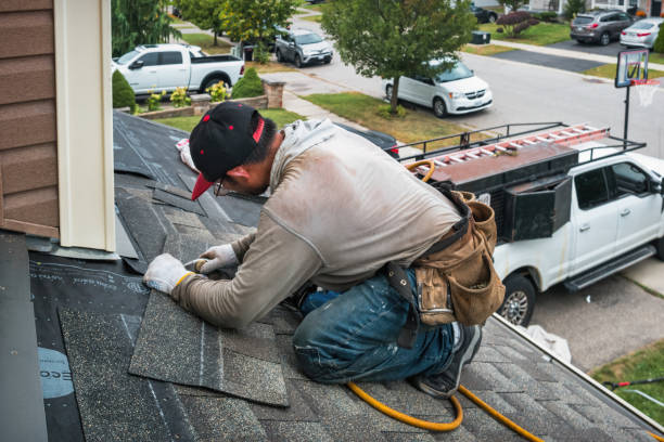 Professional Roofing technician working in Montebello, VA